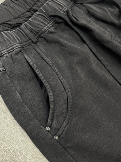 Wide leg sweatpants with waterproof layer in black washed