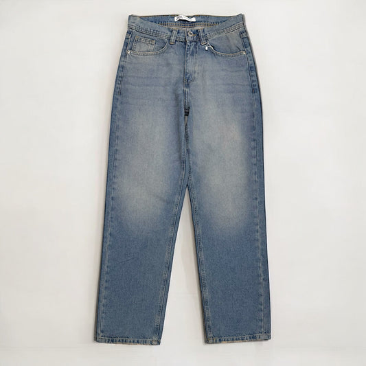 Baggy fit jeans in mid blue washed with vintage tint