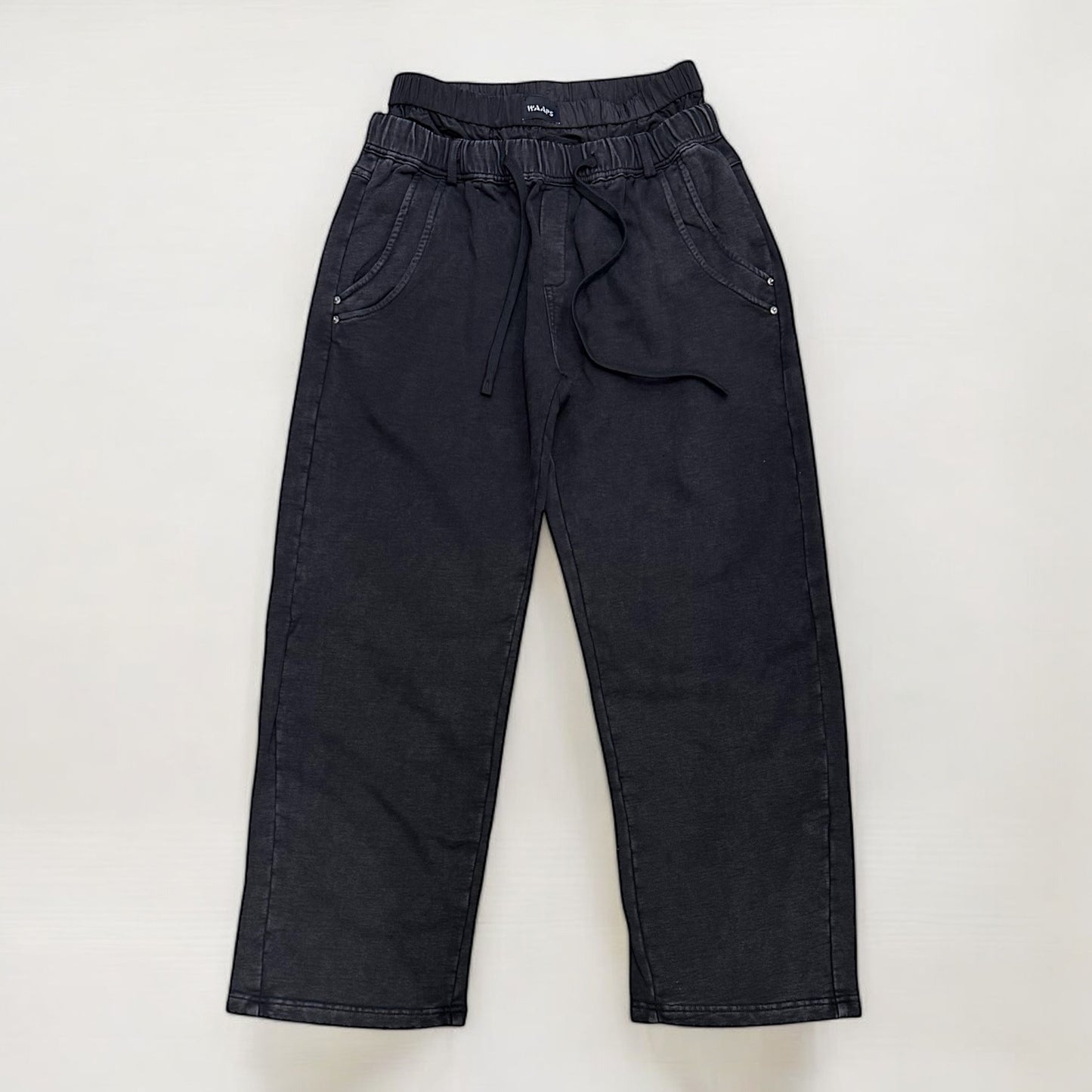 Wide leg sweatpants with waterproof layer in black washed